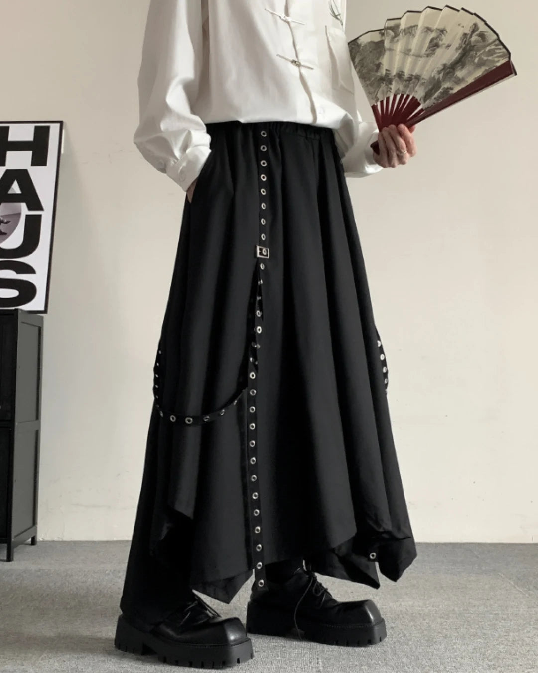 Full view of black hakama pants paired with classic shoes for a modern look.