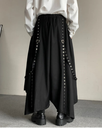 Close-up view of the flowy black hakama pants showcasing detailed design